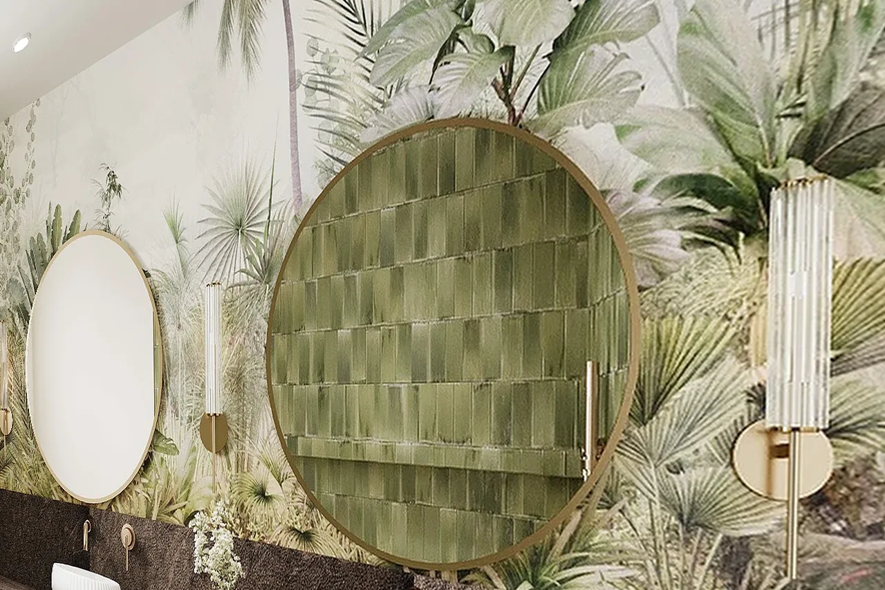 3D design of the vanity wall, with botanical wallpaper, two round brass mirrors and glass sconces