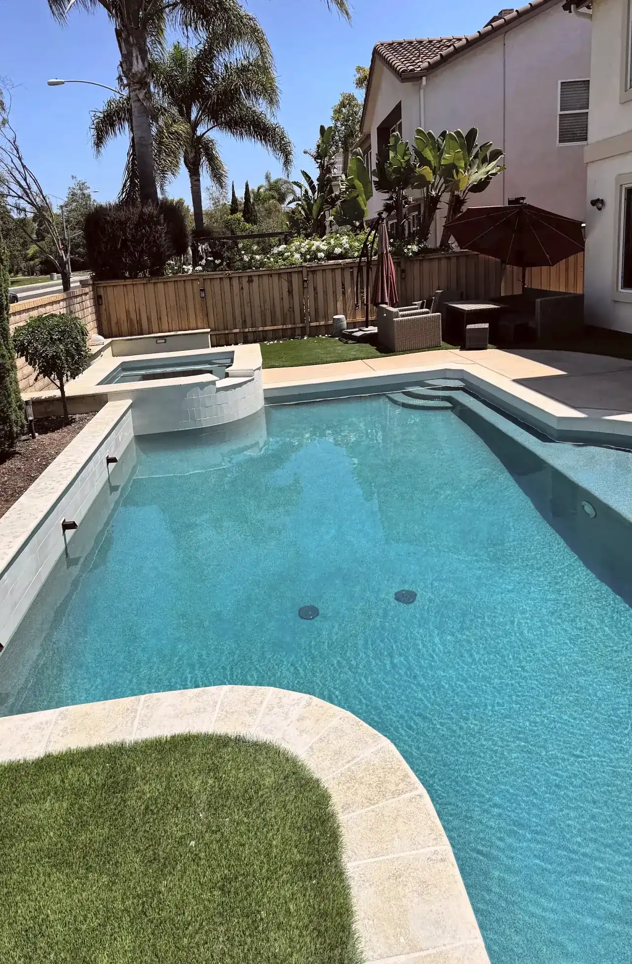 Pool and spa remodel with a raised spa in Carmel Valley